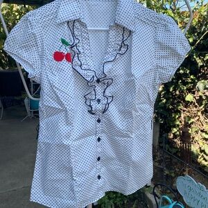 Rockabilly White Polka Dot Ruffle Button-Up Top with Cherry Appliqué